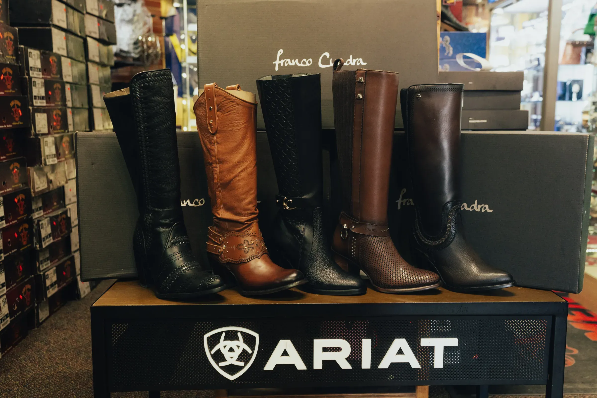 Ariat tall boots on display