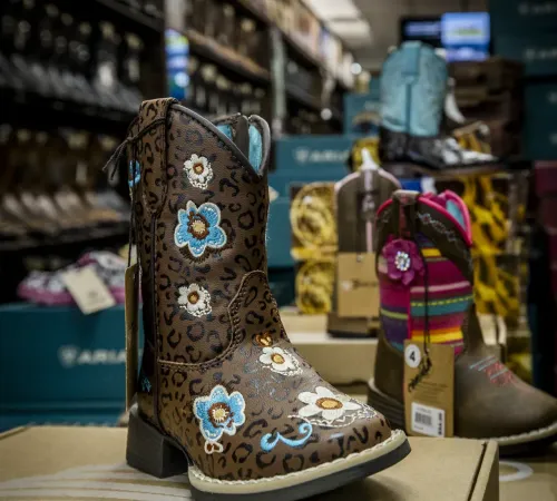 Embroidered kids' western boot on display at El Alazán