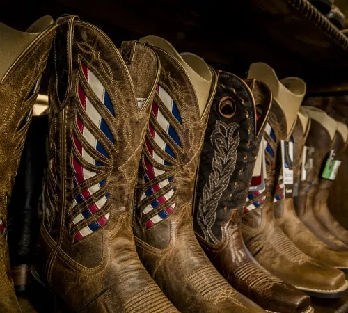 Leather square-toe cowboy boots on display at El Alazán Western Wear